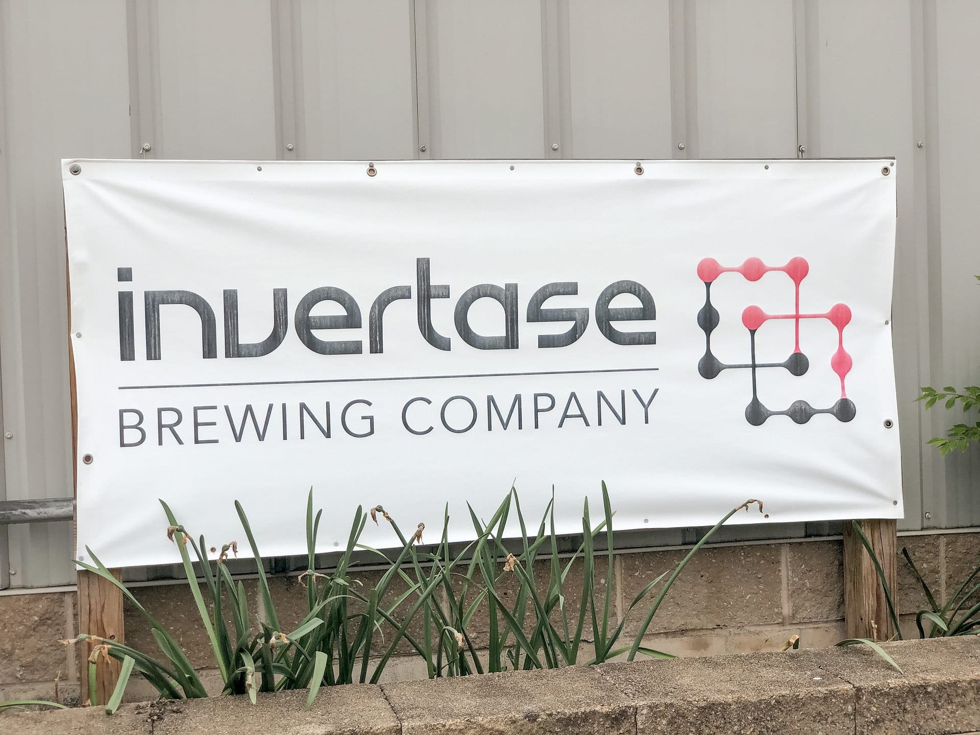 Large sign that reads Invertase Brewing Company