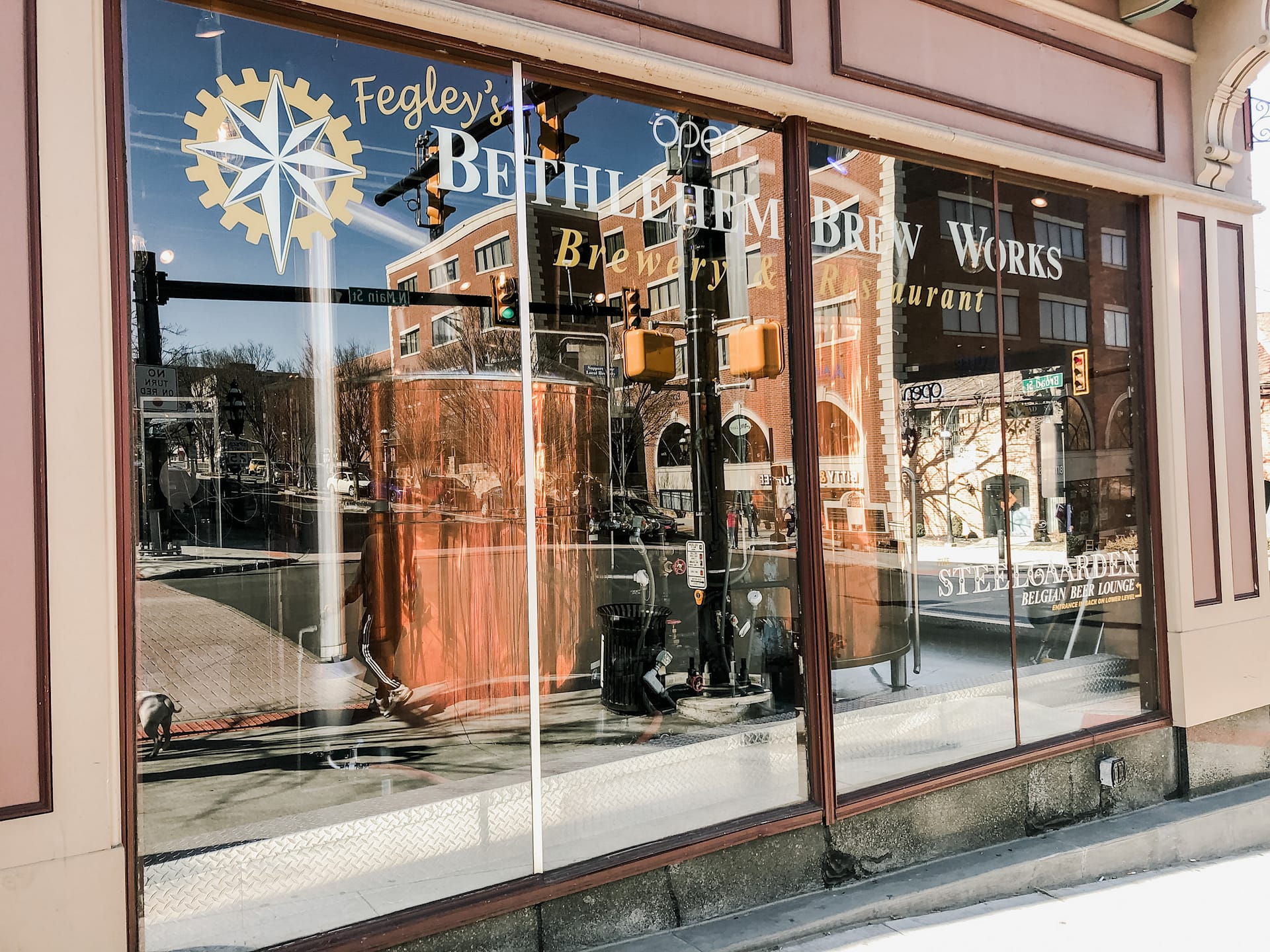 Outside view of large window reading Fegley's Brew Works